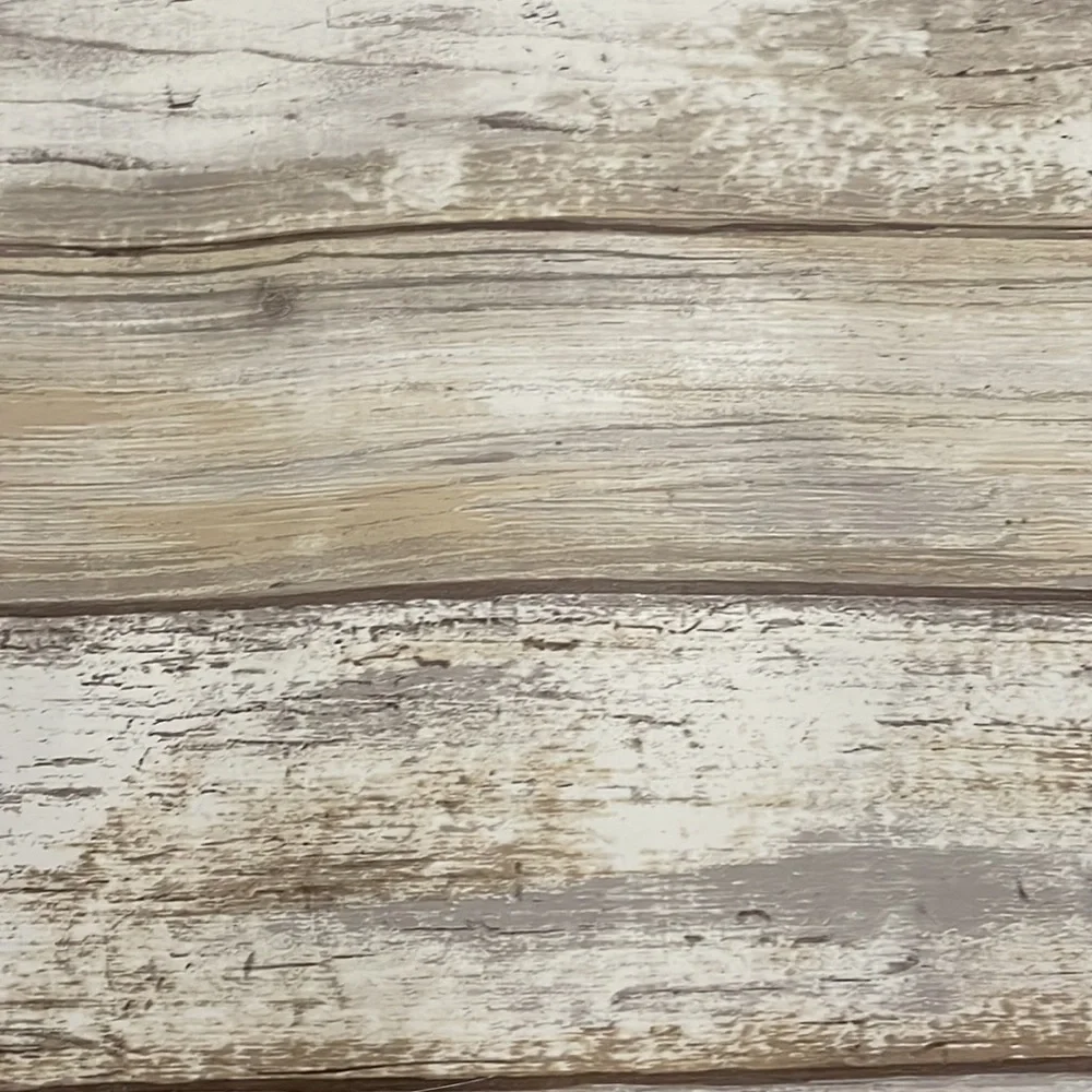 Two rolls of faux wood removable wallpaper